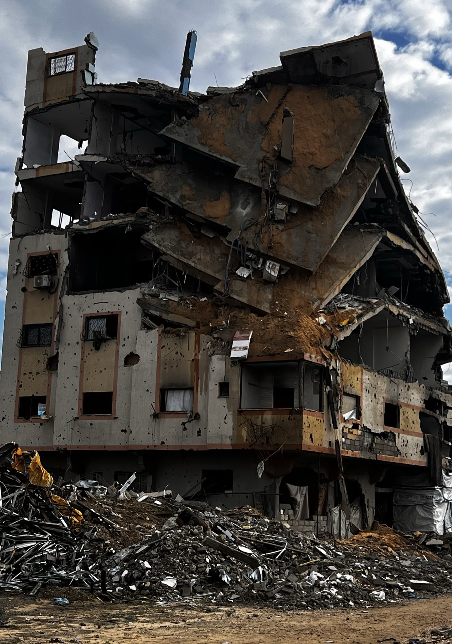 Building Damaged in Israeli Military Strike Near Tents