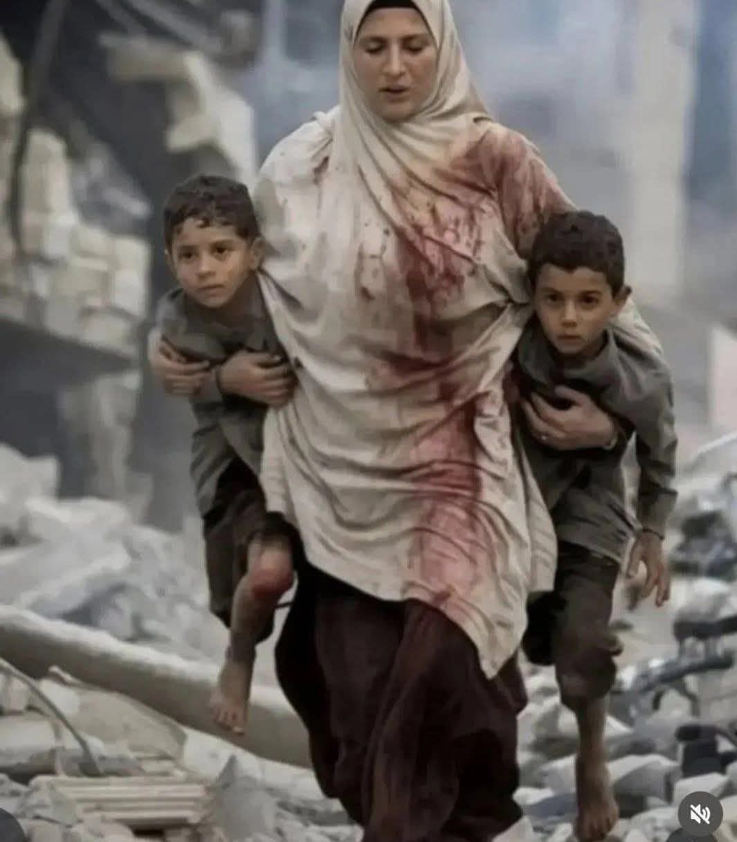 Woman bleeding carries two children through Gaza