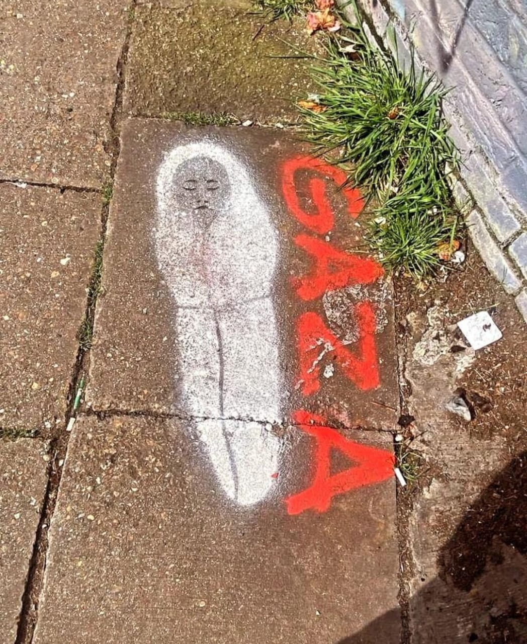 Street Art Message Urging People to Keep Talking About Gaza