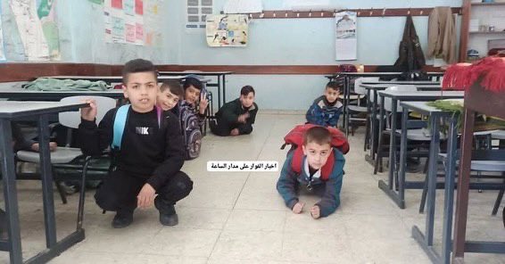 Children shelter during Israeli raid on Al-Fawwar refugee camp