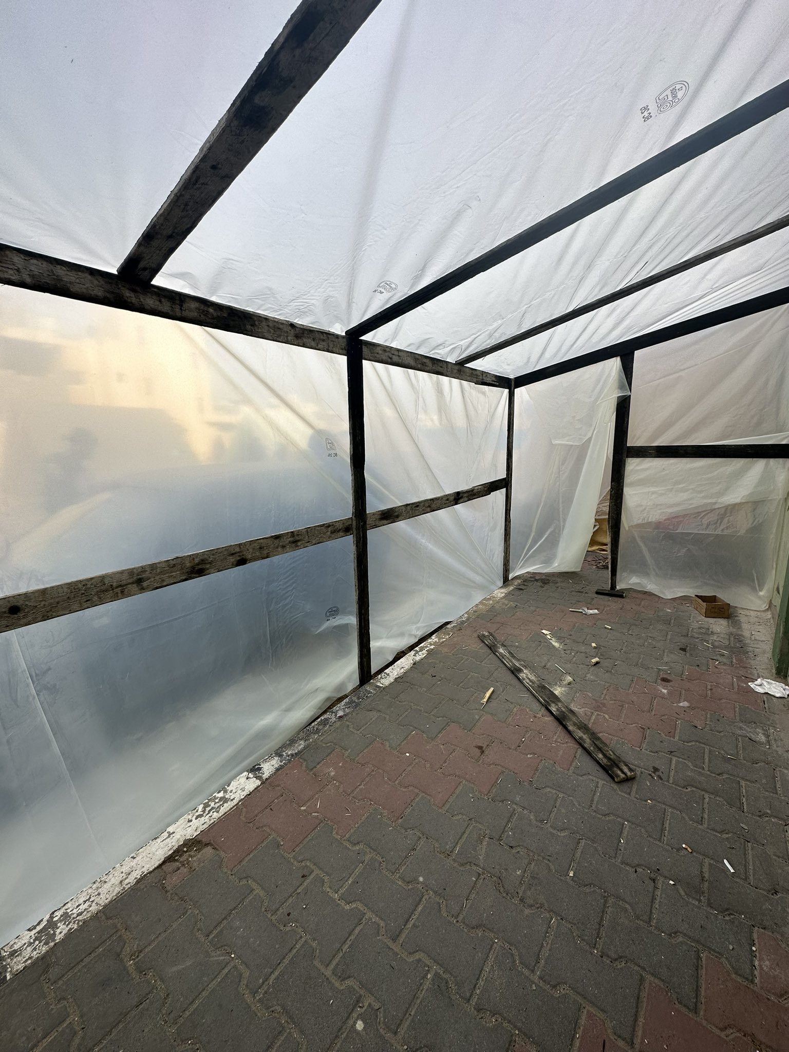 Brother Builds Tent Shelter for Neighbors in Gaza Sidewalk