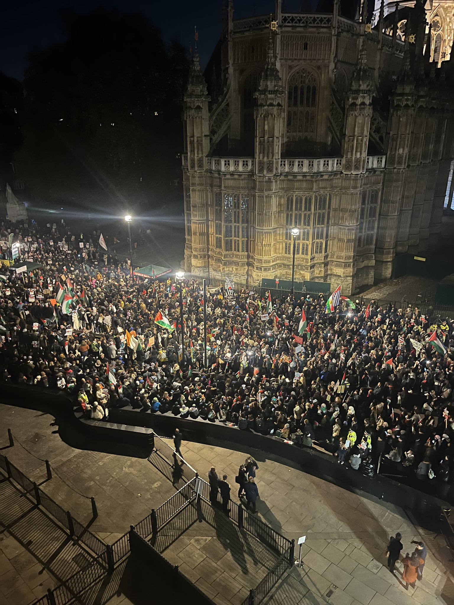 Protesters gather outside Westminster Parliament in London