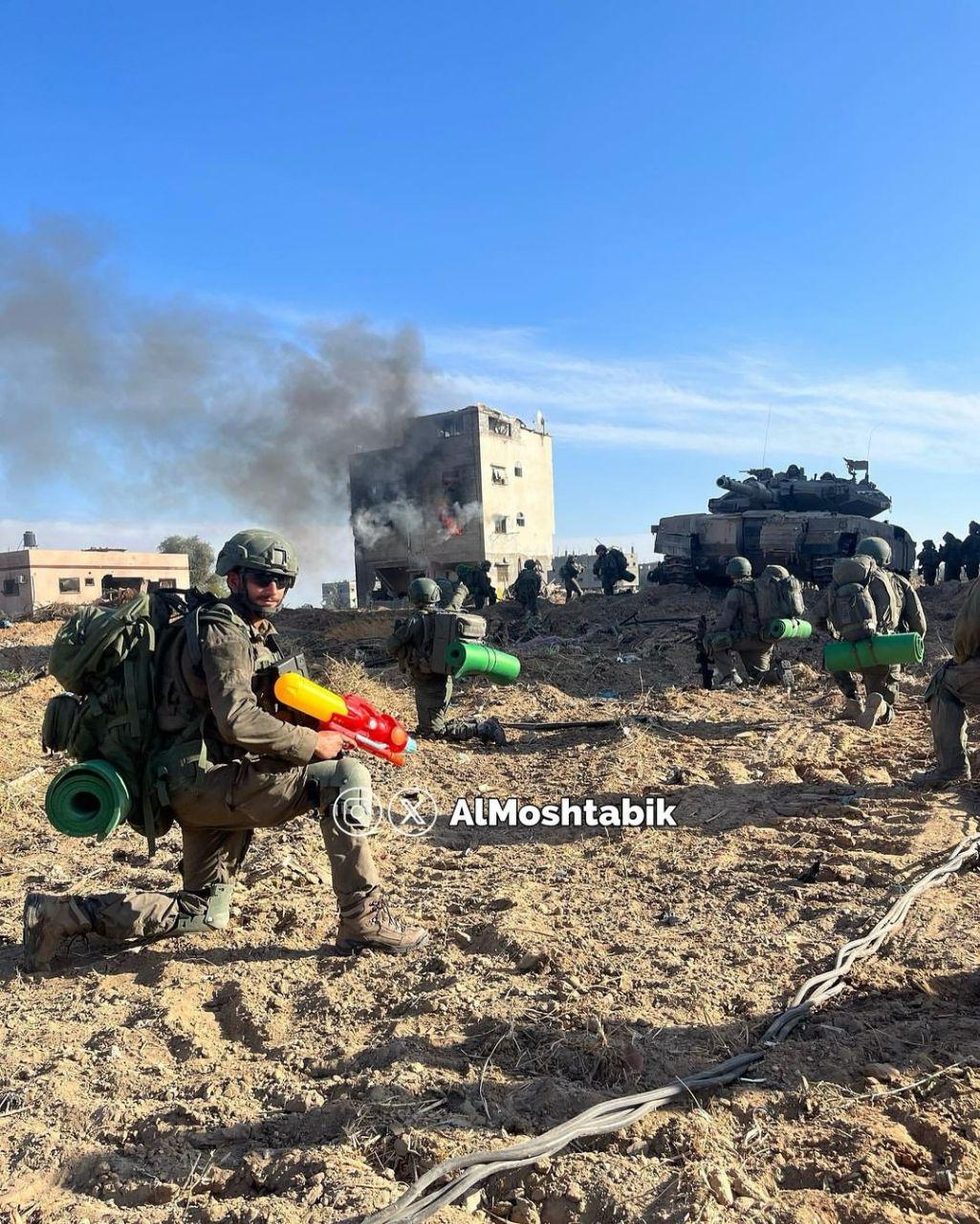 Israeli soldiers photograph themselves playing with stolen Gaza child’s toy