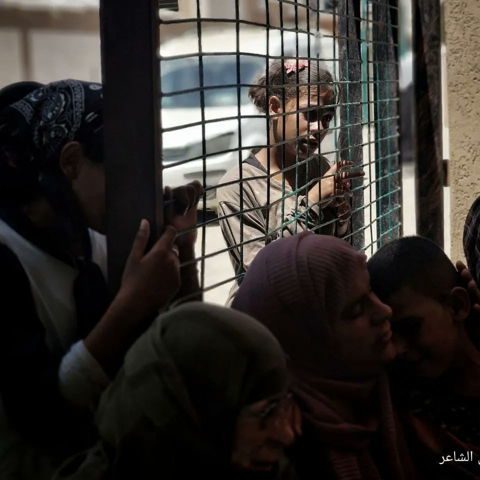 Palestinians mourn elderly woman Zaina abu Raida killed in Israeli shelling
