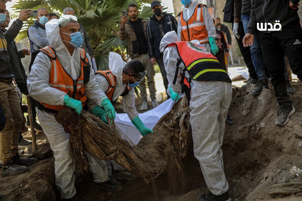 Medical teams recover remains from Al-Ahli Hospital cemetery Gaza