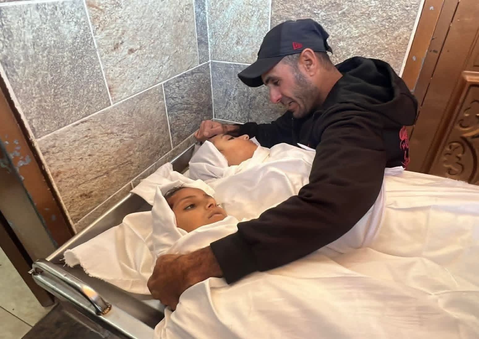 Father Holds Daughters One Last Time Before Loss