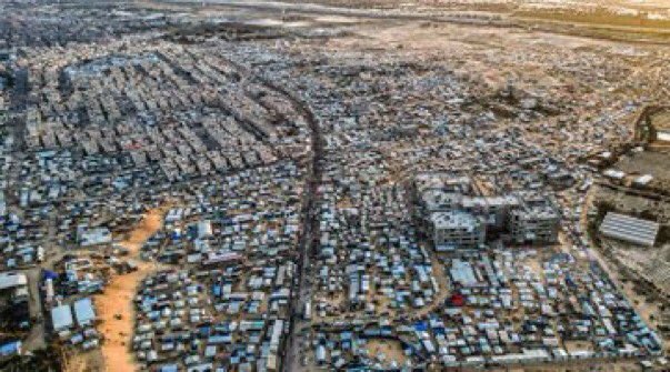 Aerial view shows massive displacement camps crowding Rafah city