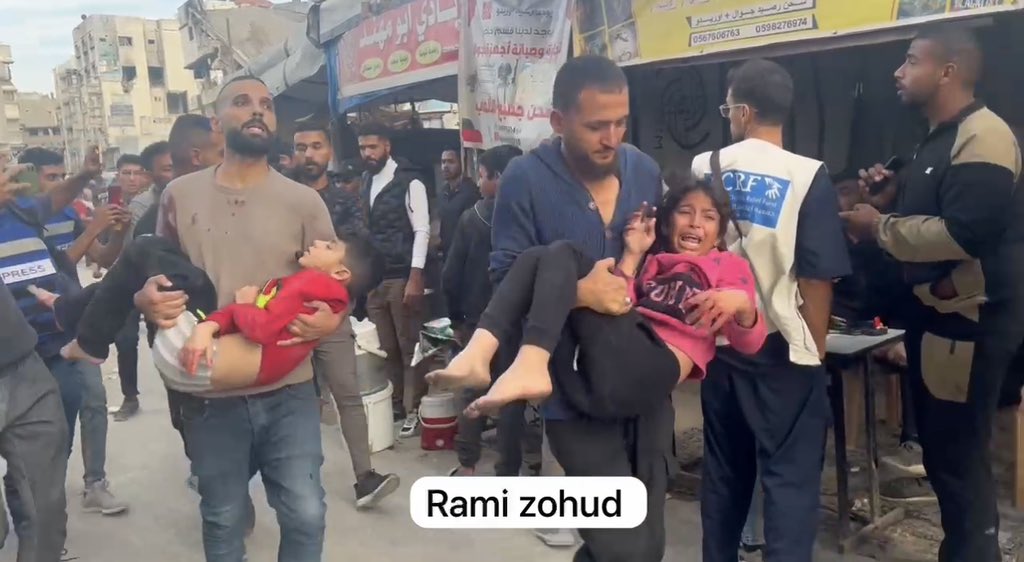 Children Evacuated After Israeli Bombing of Gaza Market