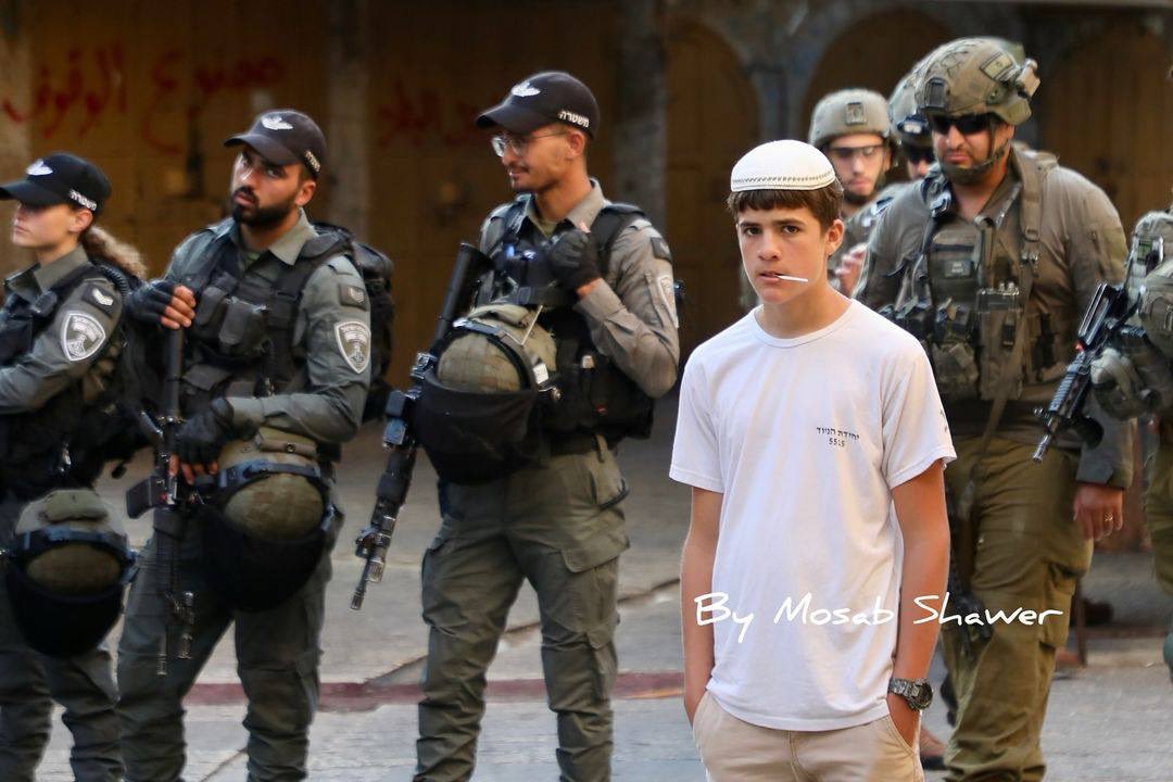 Occupation Forces Arrest Citizens at Hebron Settler March