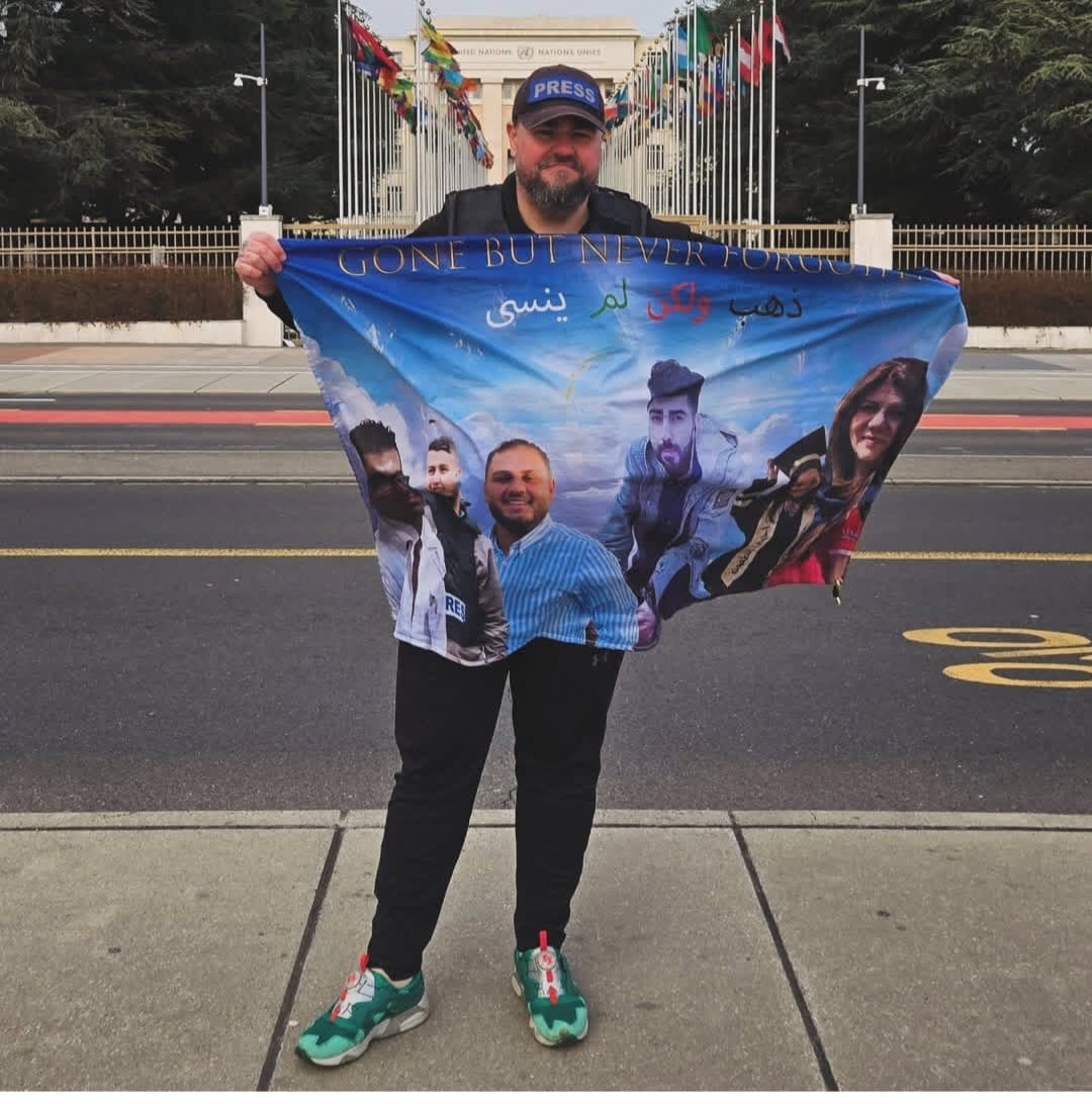 Journalist Displays Photos of Killed Palestinians at UN Geneva