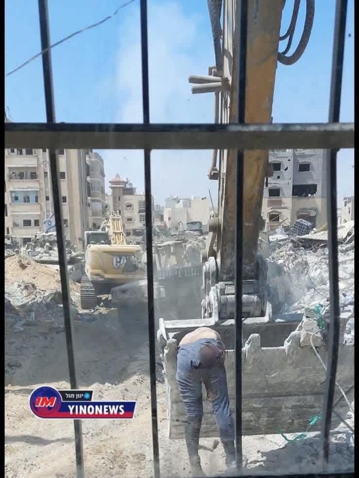 Occupation Forces Desecrate Martyrs’ Bodies in Rubble