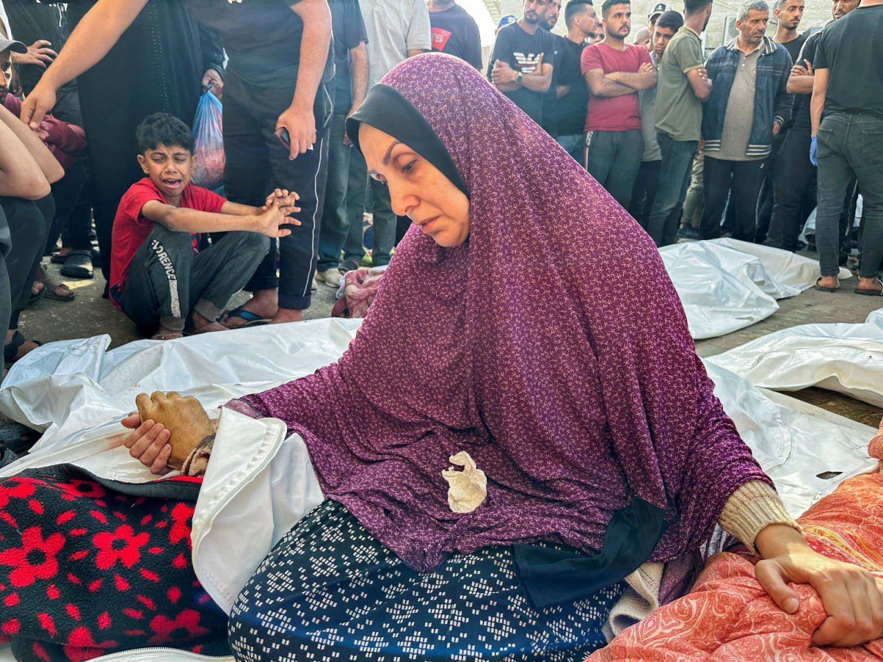 Palestinian Woman Mourns Relatives Killed in Israeli Airstrikes