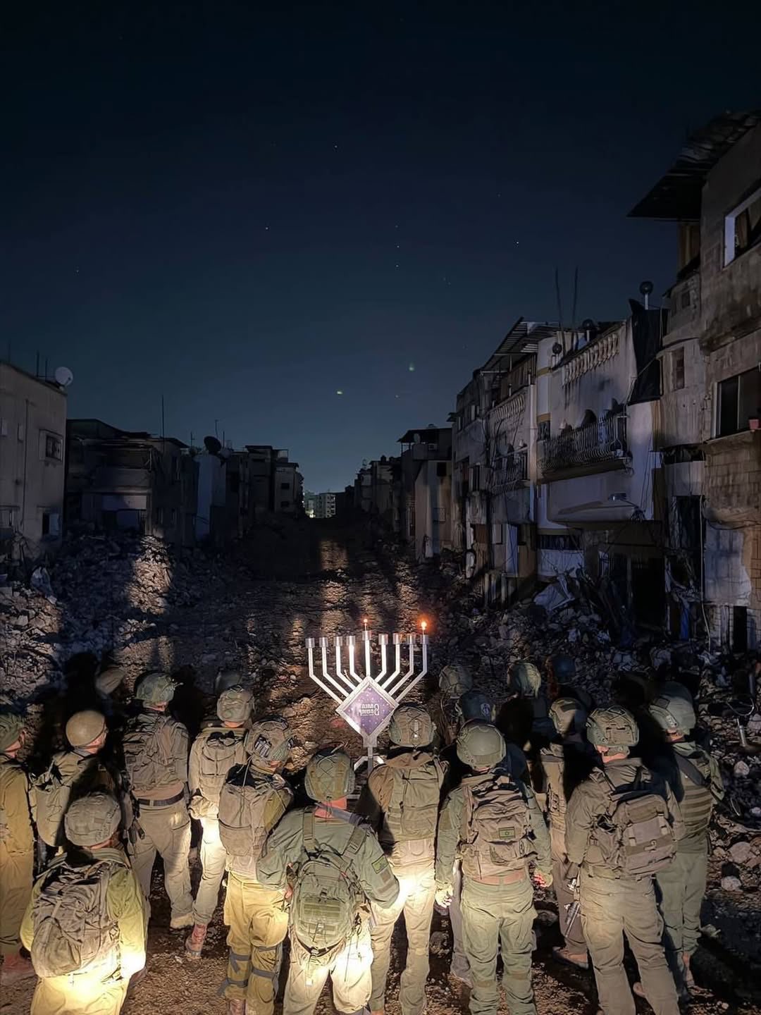 Occupation army lights Hanukkah candles in Tulkarm camp, Israel warns abroad