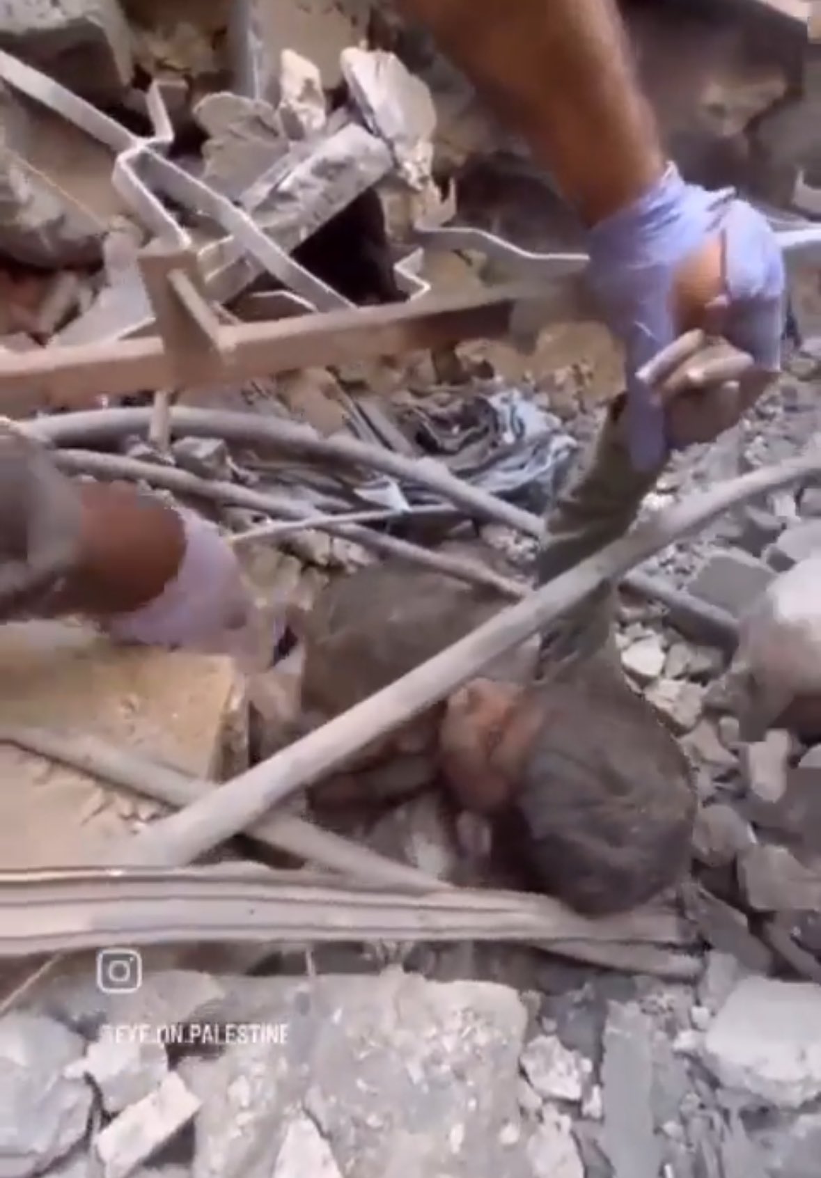Young brothers rescued after night trapped under rubble