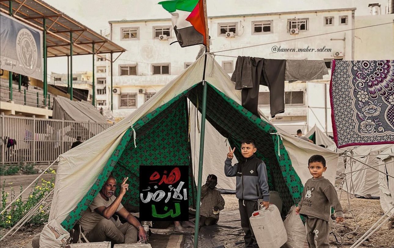 Palestinian Resilience: Victory Sign Raised Amid Displacement