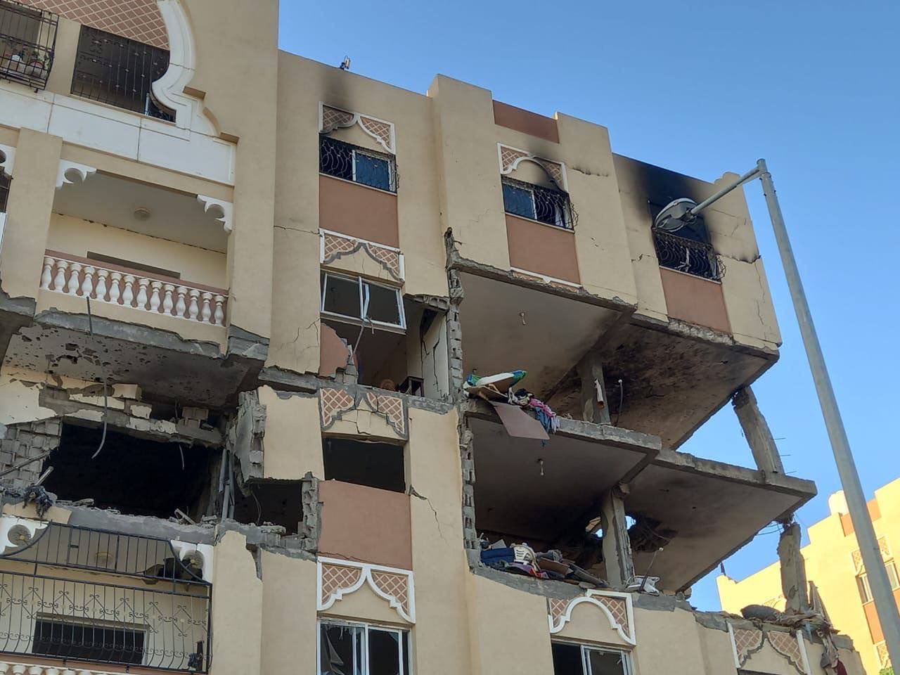 Israeli airstrikes damage residential building in southern Gaza