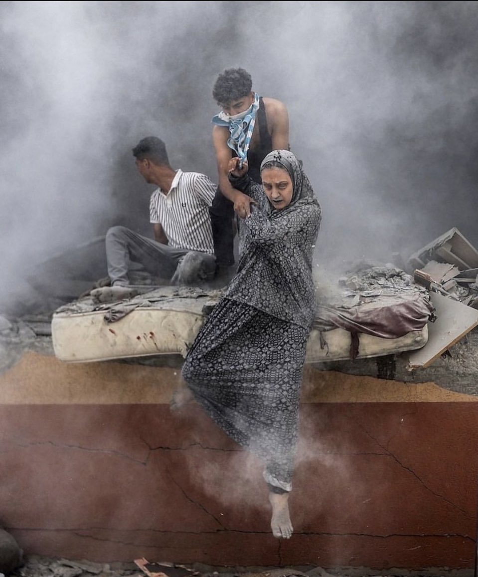 Palestinians emerge from rubble after Israeli strike Deir al Balah