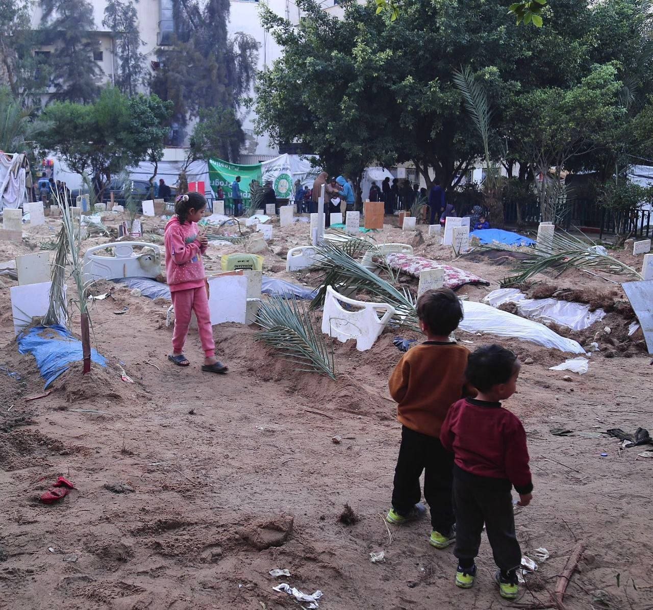 Al-Shifa Hospital courtyard becomes mass grave after Gaza deaths