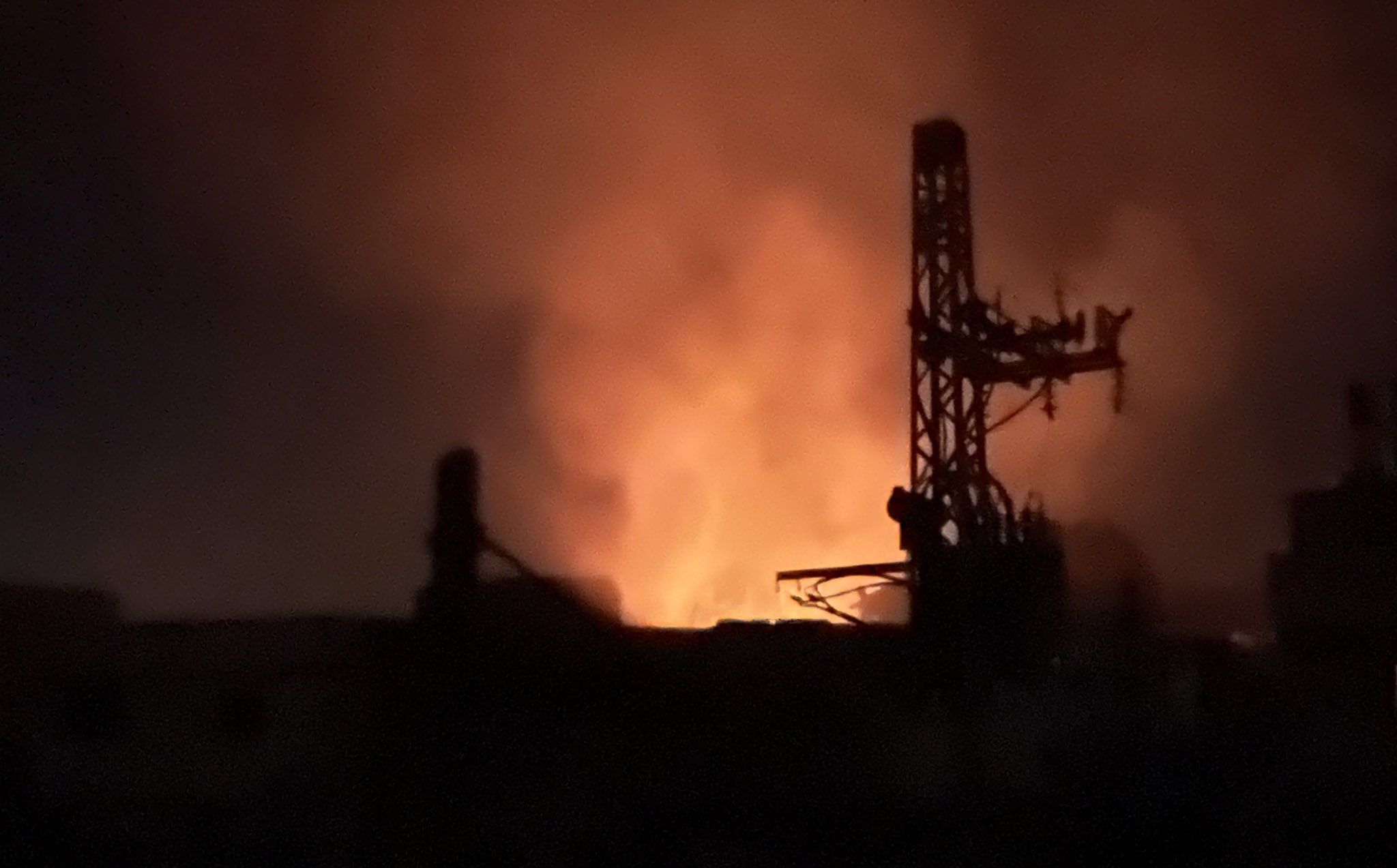 Israeli airstrike near Gaza refugee shelter causes fire, traps occupants