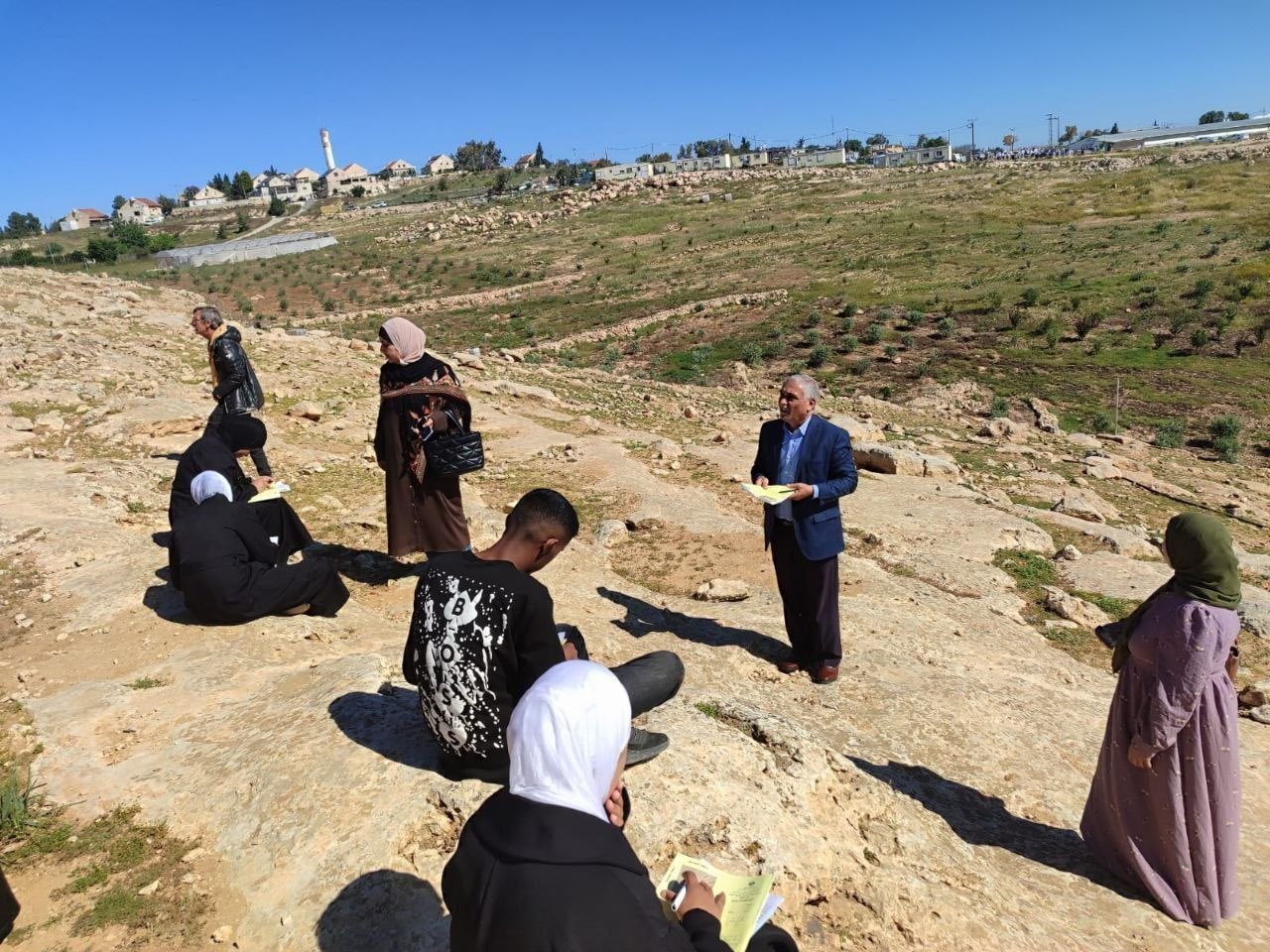 Palestinian students take exams after school access banned
