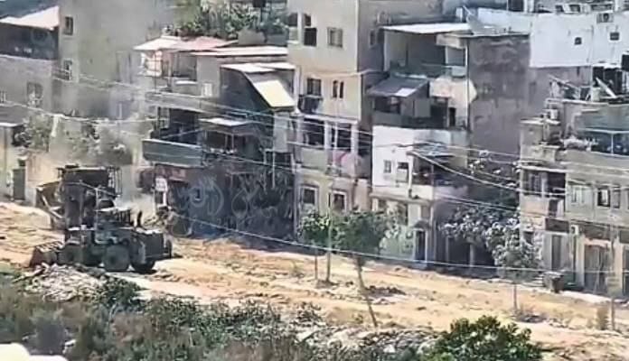 Israeli bulldozers demolish Palestinian shops in Nour Shams refugee camp