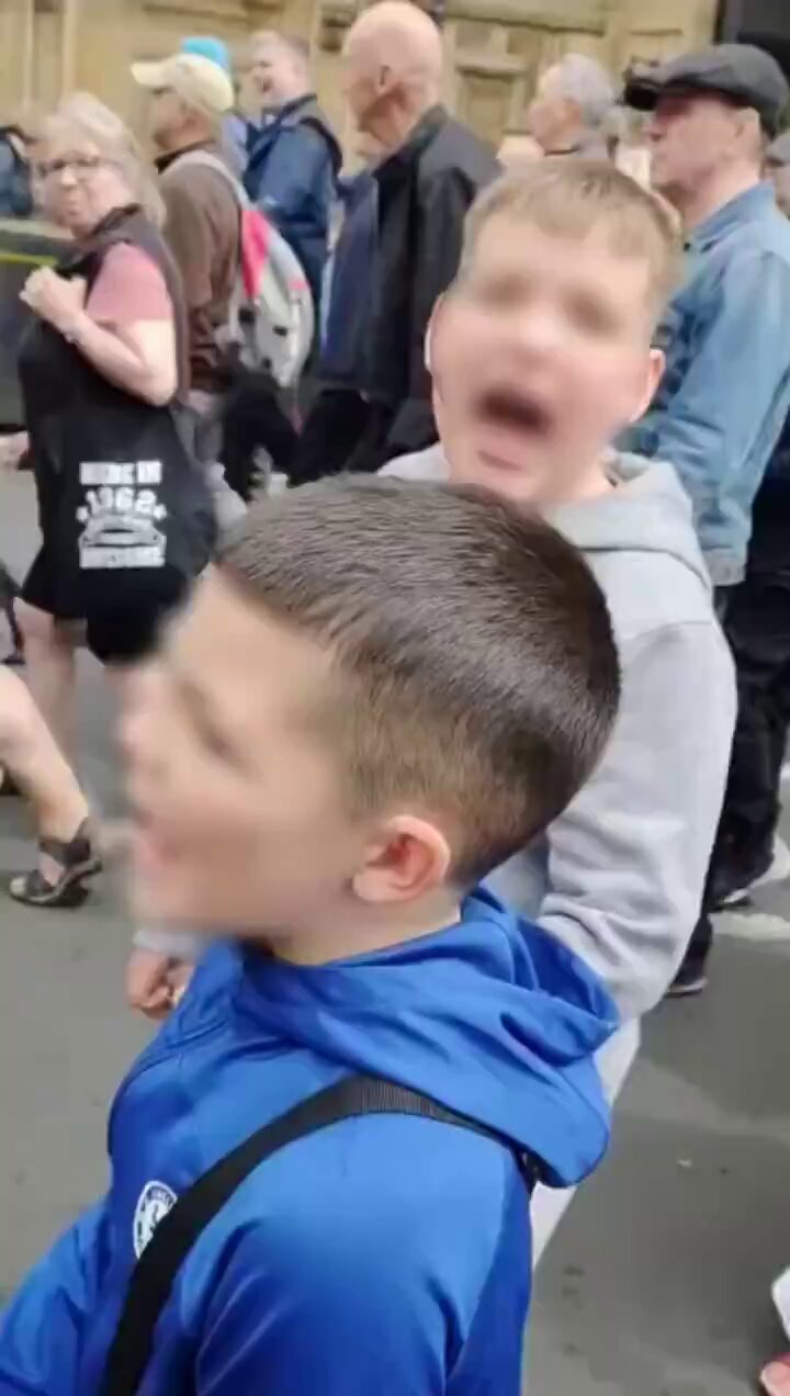 Tommy Robinson March Features Racist Chants, Police Criticism