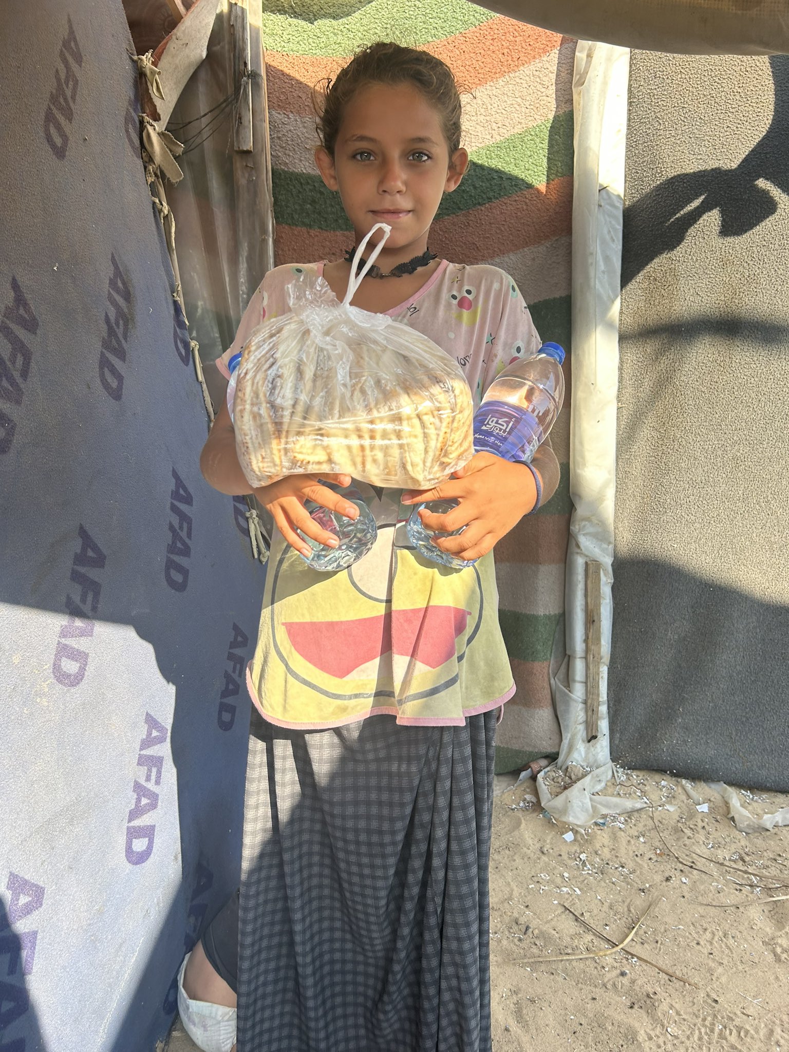 Delivering Bread and Water Aid to Gaza Refugees