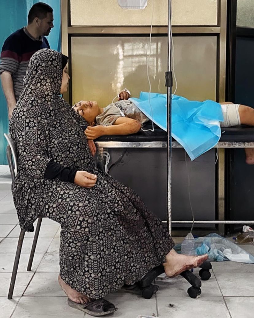 Injured mother and children at Gaza hospital