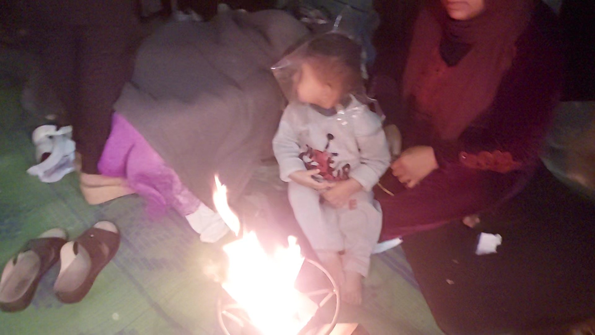 Family Struggles Through Storm in Makeshift Tent Shelter
