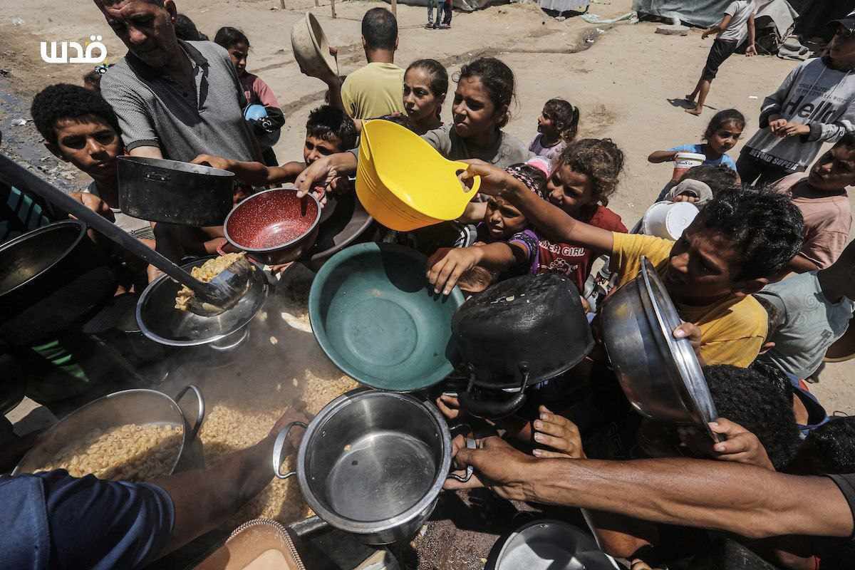 Palestinians Queue for Food Amid Israeli Siege in Gaza