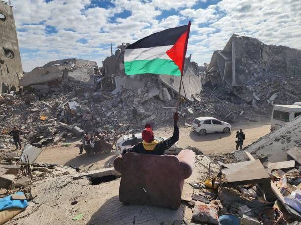 Palestinian Flag Raised in Rubble of Rafah, Gaza