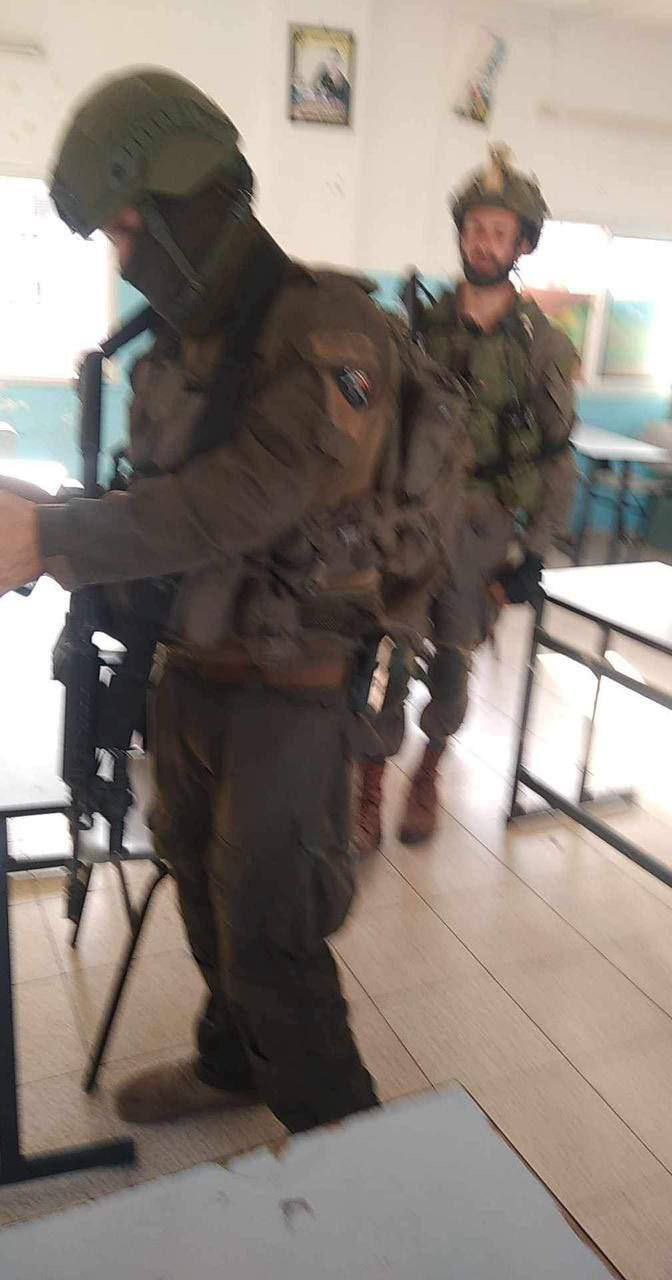 Israeli forces raid Haris village detaining dozens Palestinians