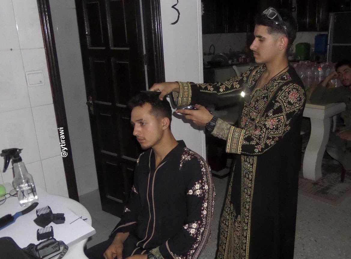 IOF soldiers wearing traditional Palestinian gowns in Gaza City