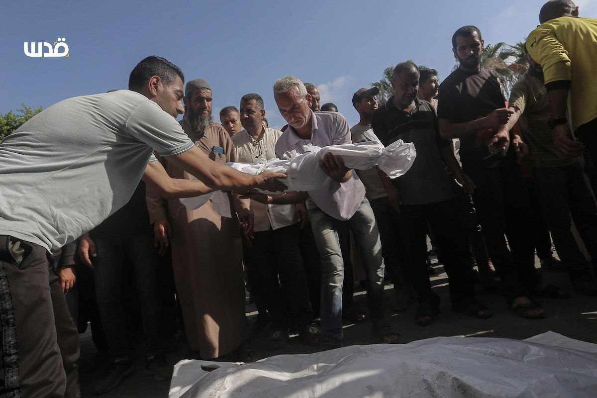 Palestinian mourners perform funeral prayers for victims of Israeli occupation