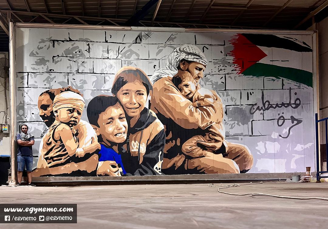 Egyptian Muralist Creates Gaza Suffering Mural