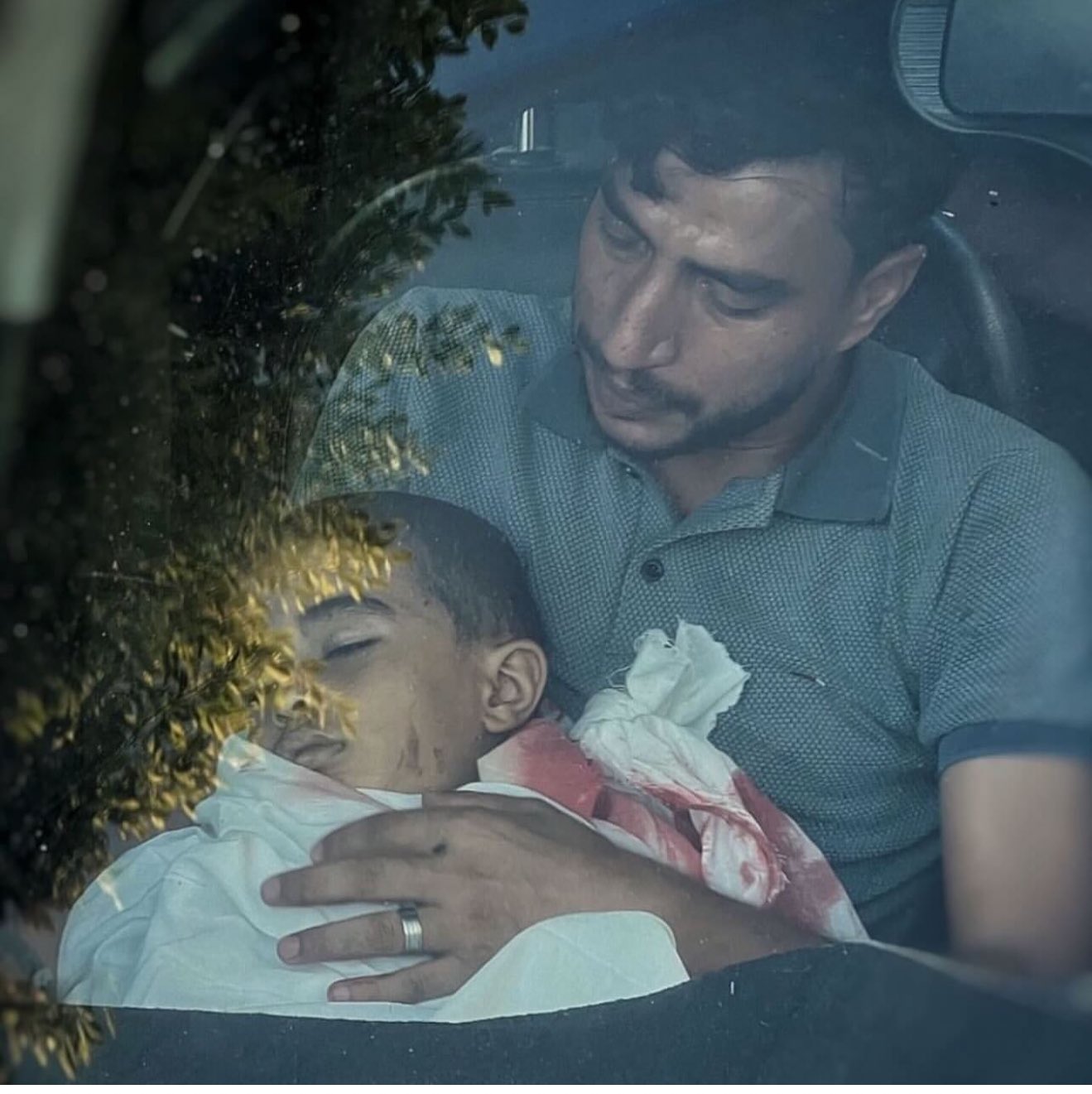 Father’s Final Embrace: Child Killed in Gaza Strike