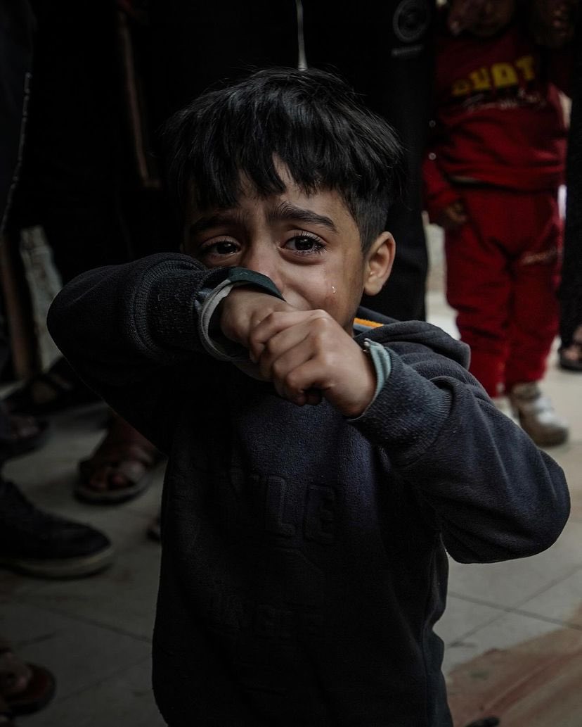 Child mourns father killed in Israeli bombing in Khan Yunis