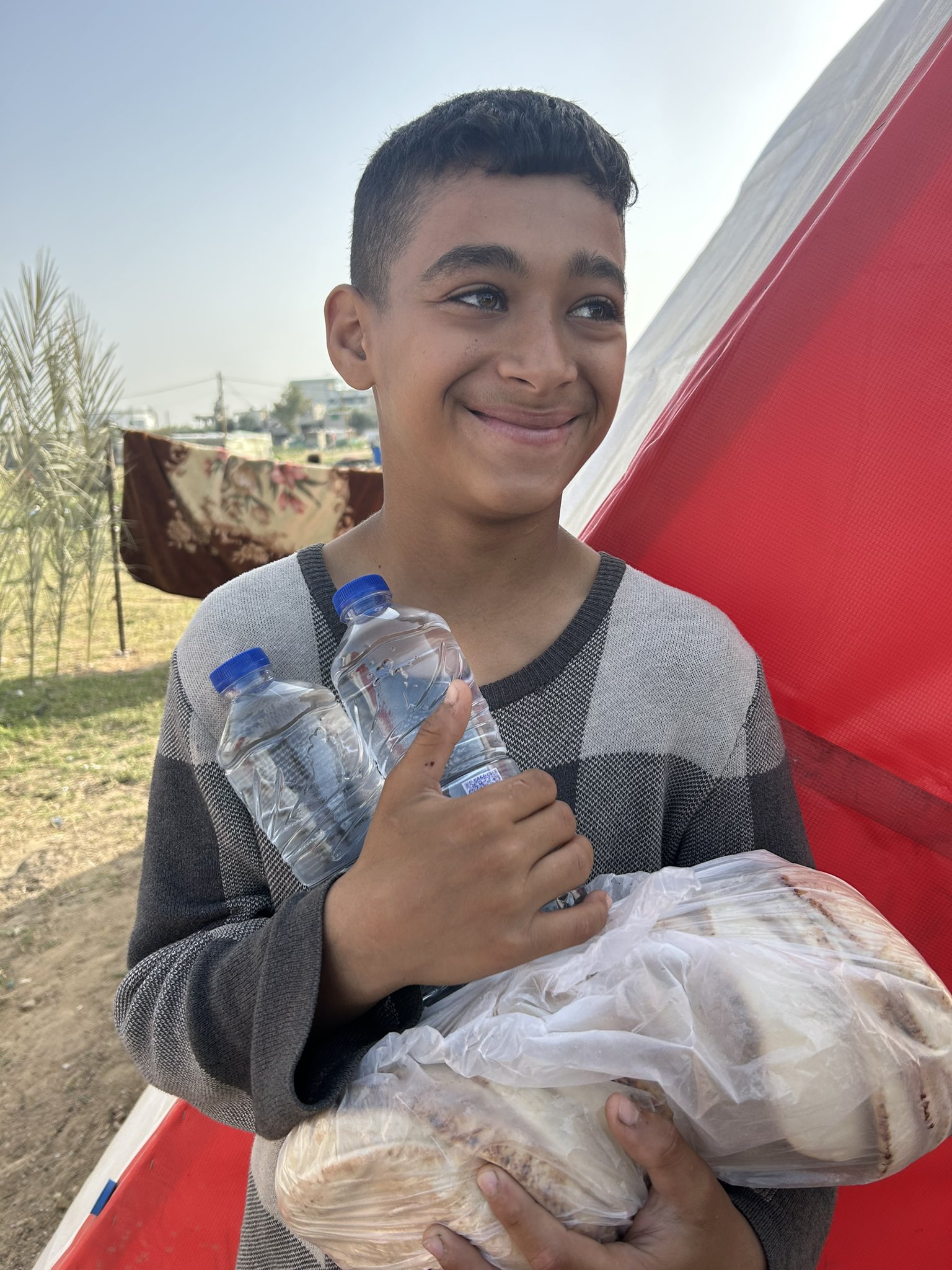 Care For Gaza Delivers Bread and Water to Displaced Families