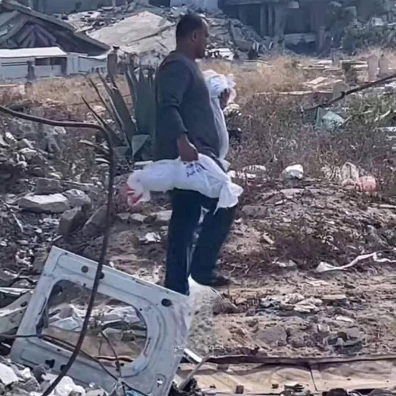 Fathers in Gaza bury children amid ongoing conflict