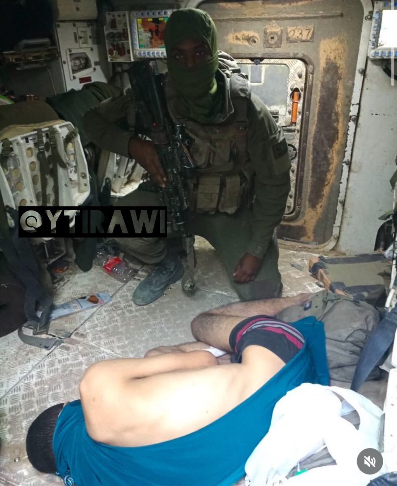 Israeli Soldier Photographed With Abused Palestinian Detainees