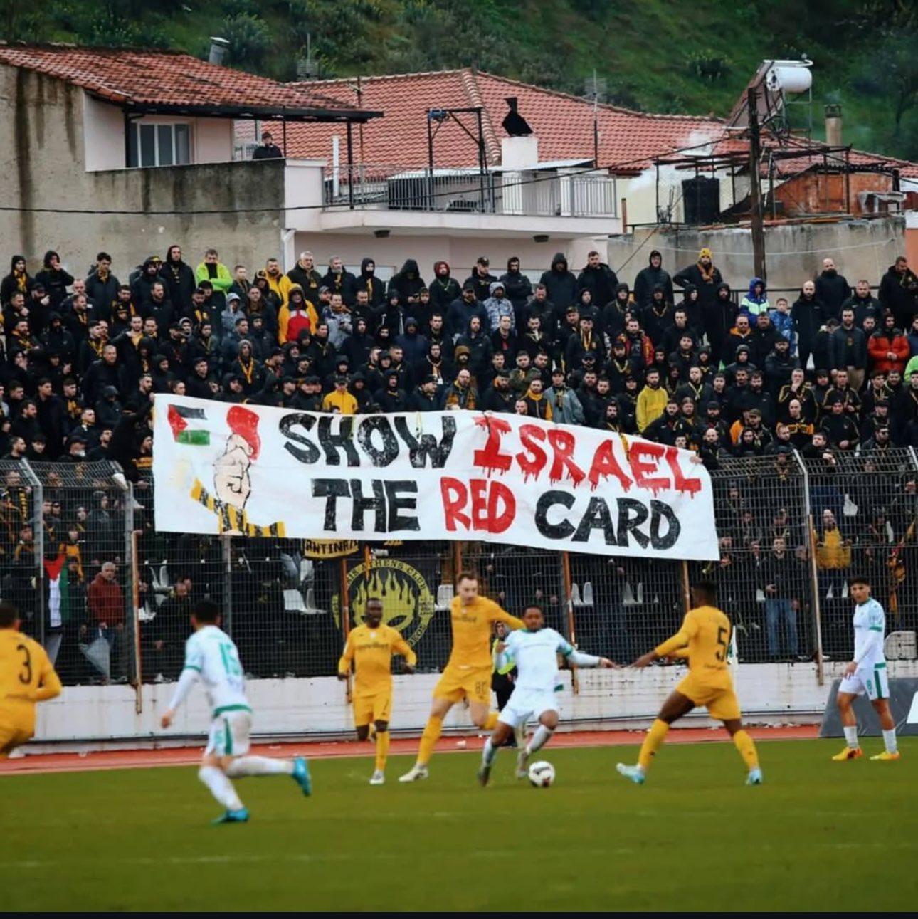 Aris Thessaloniki ultras protest during match with political banner