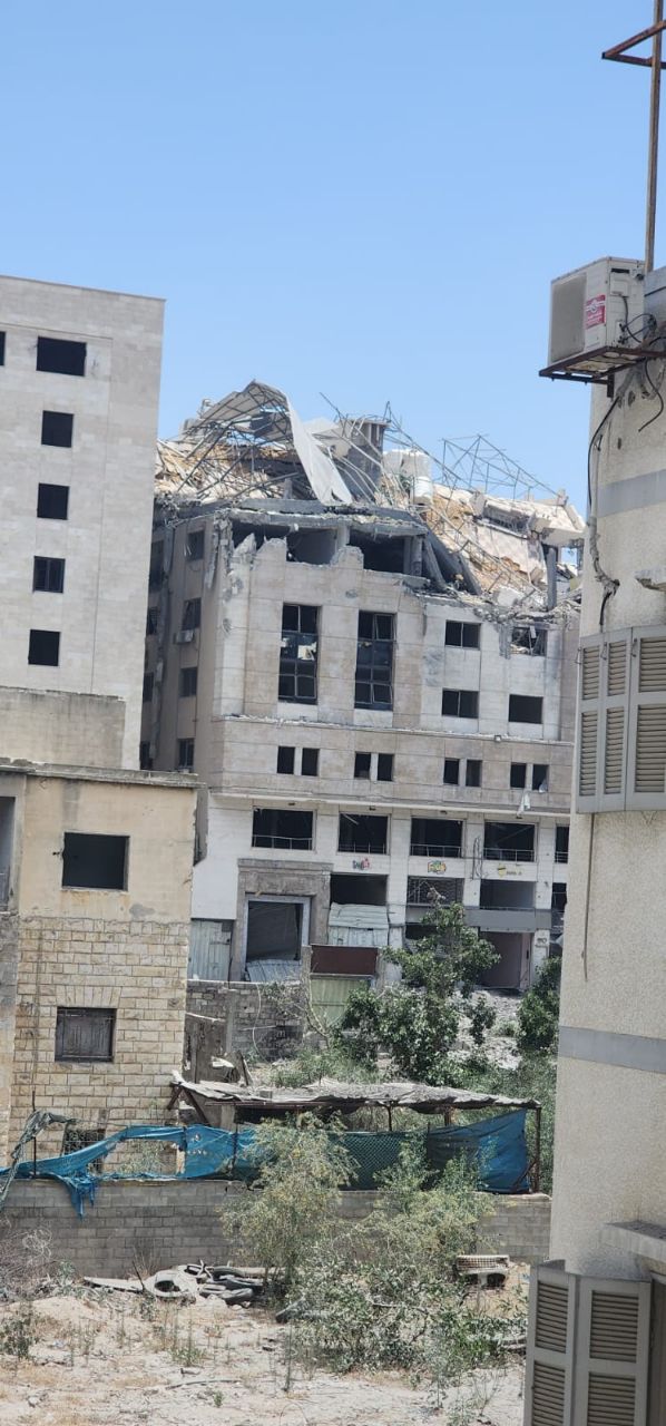 Israeli warplanes target commercial building in Gaza City