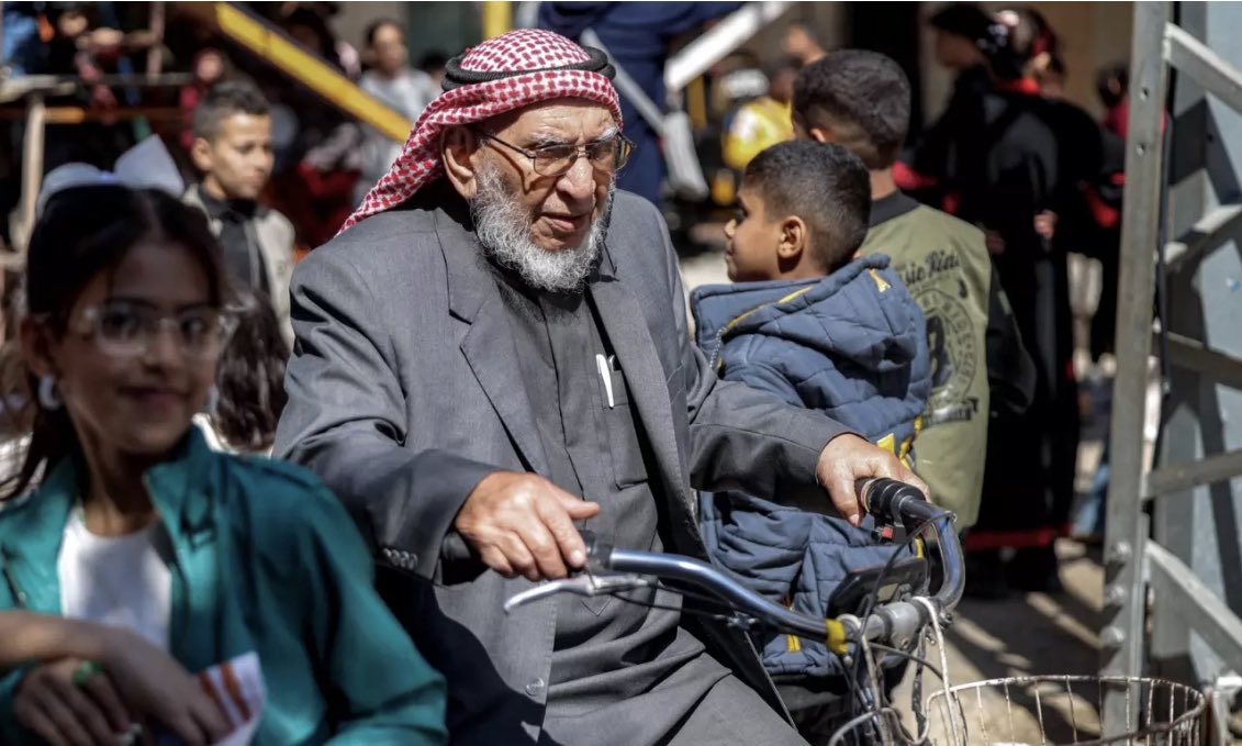 Elderly Palestinian Man Cycles Despite Israeli Airstrikes