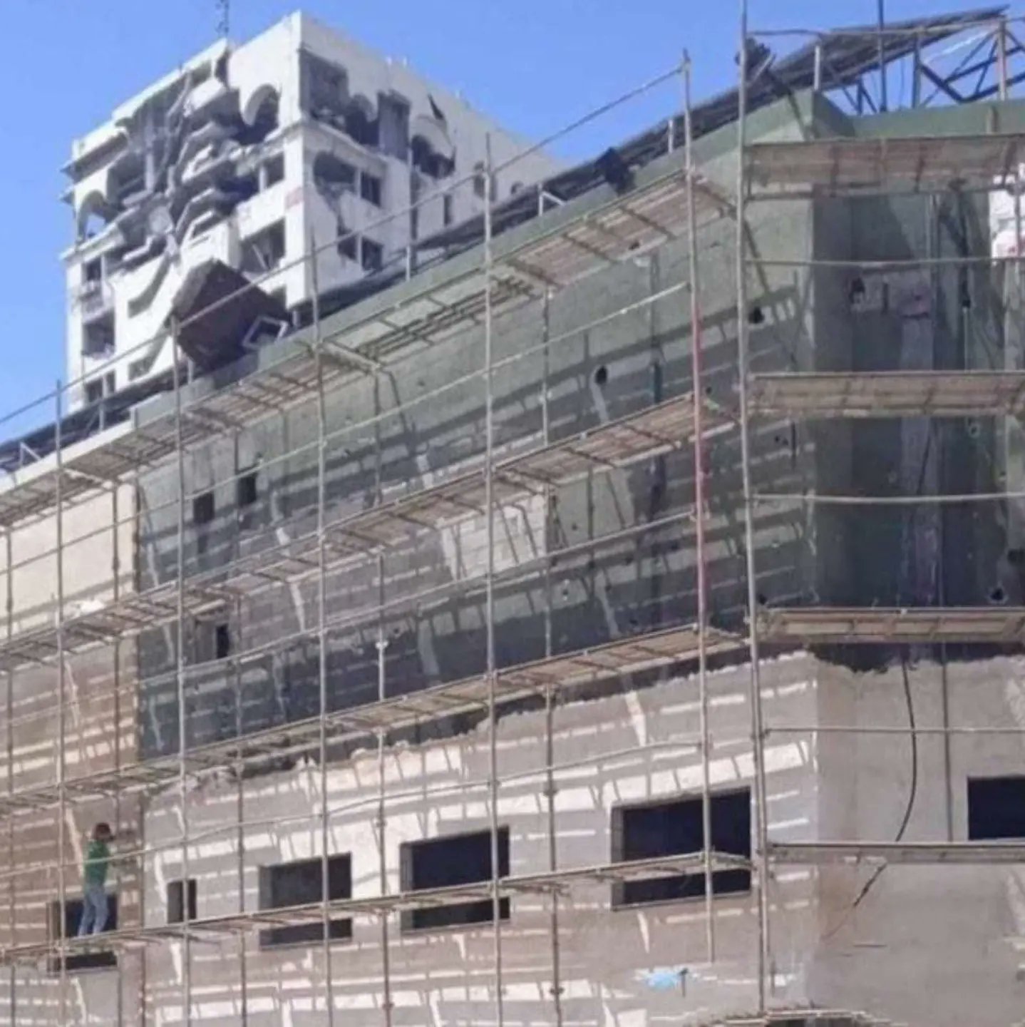 Palestinian Volunteers Work to Restore Damaged Hospitals in Gaza