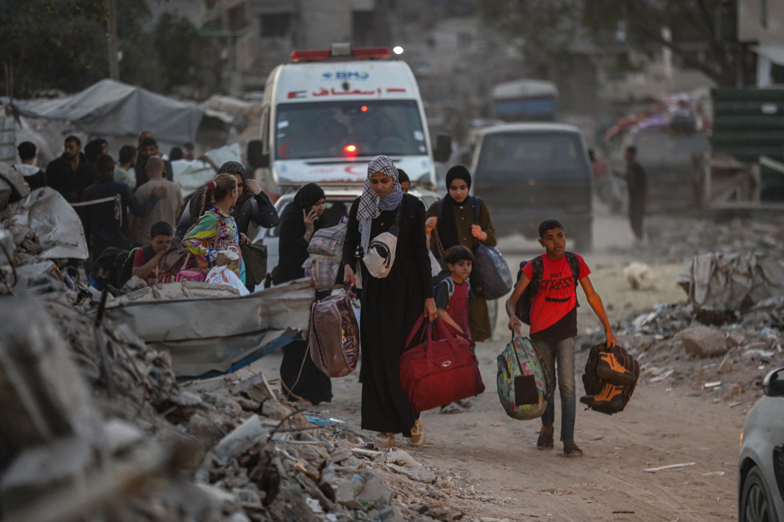 Displaced Persons Flee Gaza Camps Amid Evacuation Orders