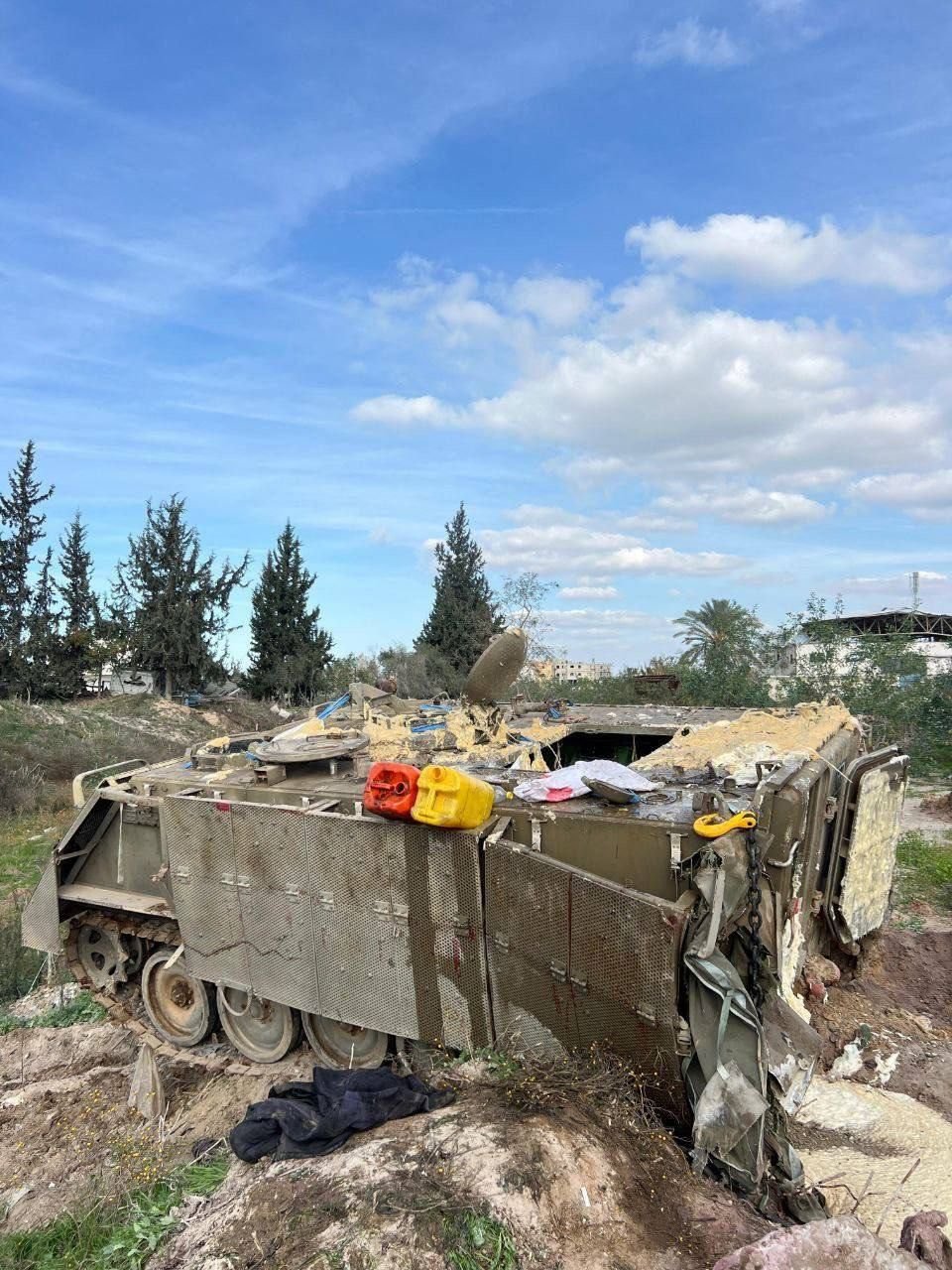 Destroyed Israeli armored carrier repurposed as garbage container in Beit Hanoun