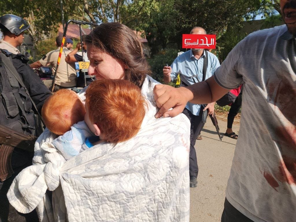 Israeli settler and children captured in Gaza by Palestinian fighters