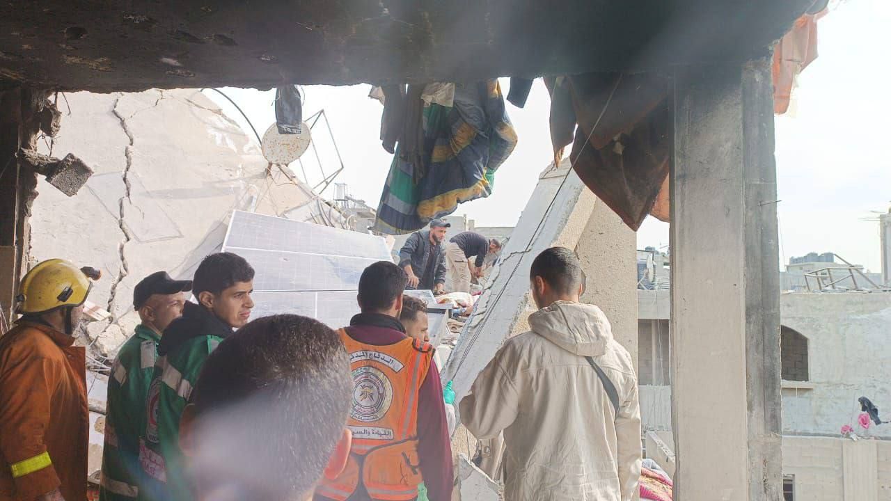 Civil defense searches rubble of bombed al-Shanti home in Gaza City
