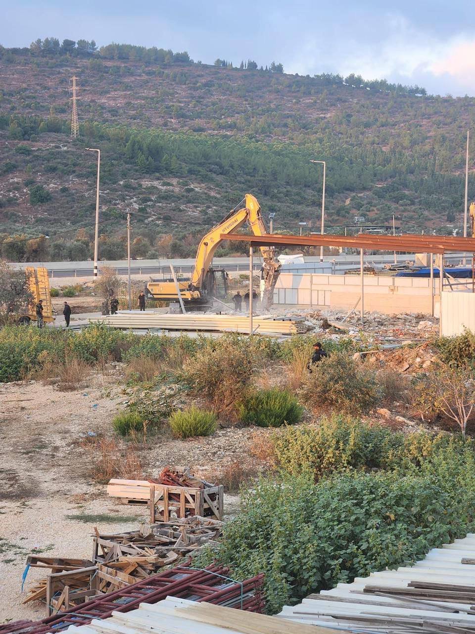 Israeli forces destroy Palestinian store in Majd al-Kurum