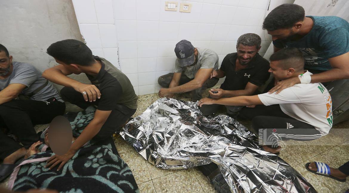 Palestinians mourn loved ones killed in Israeli bombing of Al-Bureij camp